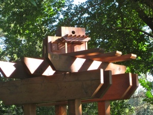 Two-family birdhouse built on pergola.  Colorado Springs, CO