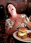 Glee orders "Heart Attack" burger: big hamburger with egg, bacon, cheese, sweet potato tater tots.