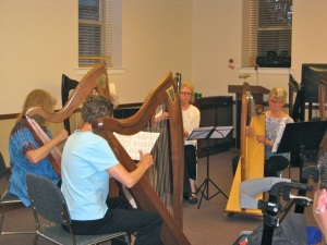 Harpists practice for their Saturday night recital.