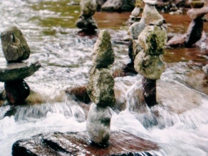 Rock Balancing in Fountain Creek.  Photo by Jerilee Bennet.