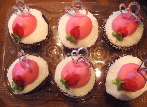 This Valentine's Day, I wish you love, tulips, and deli chocolate cupcakes with fancy pink icing.  Enjoy.  (You have ten minutes to eat your cupcakes and get back to work, so get busy!)  ;)