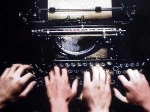 typewriter w: 4 hands