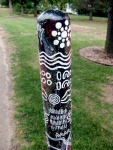 African Message Pole, Rolling Hills Zoo, Salina, KS.  I think it's a happy message.
