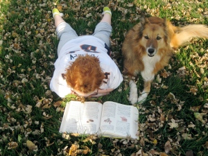 Reading aloud to a dog is good for both the reader and the pet.